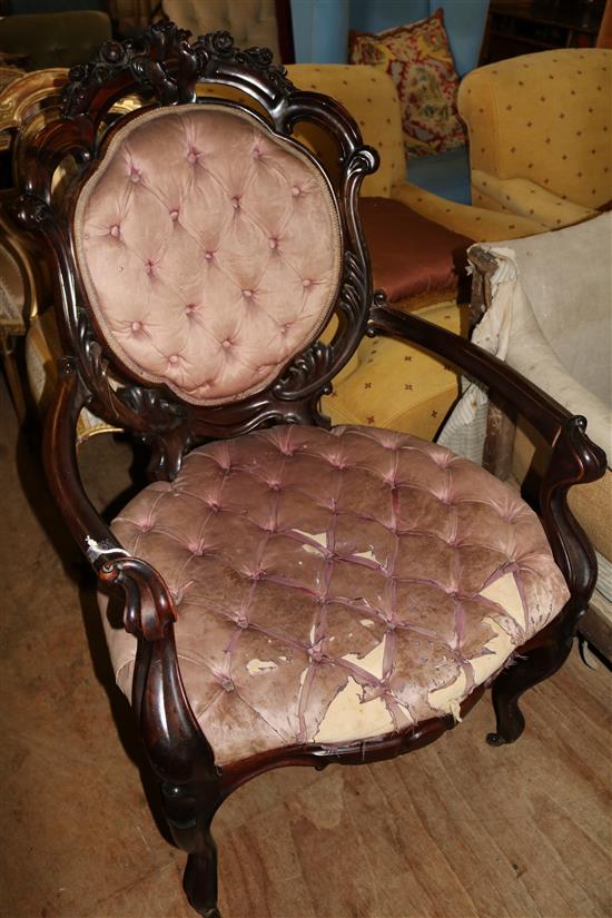 A Victorian rosewood open armchair, H.3ft 6in.